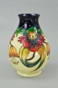 A MOORCROFT POTTERY VASE, 'Tiger Lily' pattern, impressed and painted marks to base, approximate