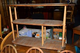 AN ERCOL 1960'S ELM AND BEECH THREE TIER TROLLEY (in need of restoration)