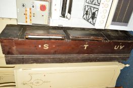 A STAINED PINE BENCH with hinged storage