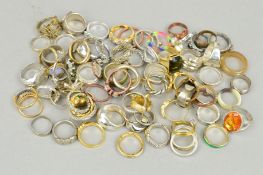 A SELECTION OF SEVENTY NINE RINGS of varying designs, silver and gold coloured set with gems,