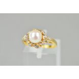 A MODERN 18CT GOLD DIAMOND AND CULTURED PEARL DRESS RING, estimated total modern round brilliant cut