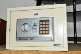 A SAFEWELL ELECTRONIC SAFE (key and instructions)