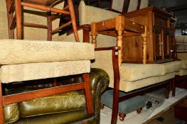 A WOODEN FRAMED THREE PIECE LOUNGE SUITE comprising of a two seater settee and a pair of armchairs