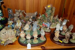 A GROUP OF ORNAMENTS, to include Royal Doulton Natures Heritage collection of six owls, with stand
