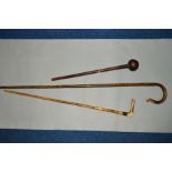 A HARDWOOD KNOBKERRY, a silver collared walking stick and a crook (3)