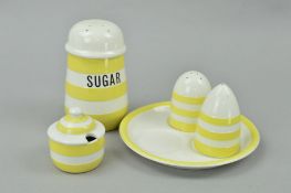 T.G.GREEN CORNISH WARE, a three piece cruet set and stand and a 'Sugar' castor, all yellow and white