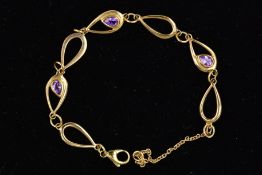 A MODERN 9CT GOLD AMETHYST LINK BRACELET, open pear shape link with alternating amethyst rub over