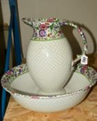 A WILKINSON LTD JUG AND BOWL with floral banding to the rim (2)