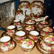 ROYAL CHELSEA 'GOLDEN ROSE' TEA WARES, etc to include coffee and tea pots, serving plates, seven tea