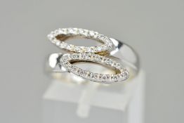 A MODERN 18CT WHITE GOLD DIAMOND DRESS RING, two crossover diamond set marquise shapes, estimated