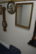 A 20TH CENTURY CIRCULAR BRASS CONVEX WALL MIRROR, a mahogany wall mirror and another mirror (3)