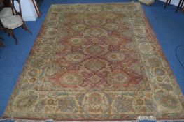 A LARGE WOOLLEN CARPET SQUARE, red, gold and green ground, foliate design, approximate size 364cm