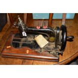 A LATE19TH CENTURY SELLERS & CO SEWING MACHINE, four various wicker baskets and three various