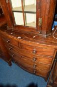 A GEORGIAN MAHOGANY BOWFRONT CHEST of two short and three long graduated drawers on bracket feet,