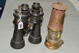 A PAIR OF MILITARY NAVAL BINOCULARS, together with an Eccles Miner's lamp (rusty) (2)