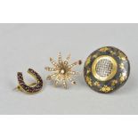 THREE BROOCHES, the first a late 19th Century tortoiseshell pique brooch of circular outline with