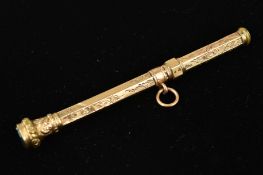 AN EARLY 20TH CENTURY GOLD CASED RETRACTABLE PENCIL, fully engraved with a foliate and scroll