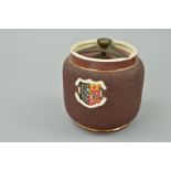 A MACINTYRE TOBACCO JAR, with 'Exeter' crest, approximate height 11.5cm