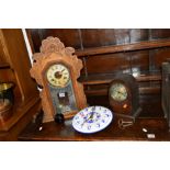 A CARVED OAK AMERICAN MANTLE CLOCK, another mantle clock and an enamel wall clock (winding key) (3)