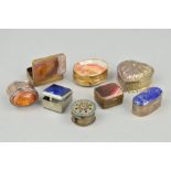 EIGHT PILL BOXES to include four with agate set lids and bases, one with a lapis lazuli lid, one set