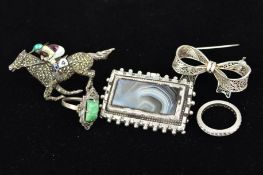 FIVE ITEMS OF SILVER AND WHITE METAL JEWELLERY to include a marcasite and enamel jockey brooch, a