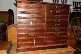 AN EDWARDIAN MAHOGANY HABERDASHERY CABINET made up of eighteen drawers, approximate width 87.5cm x