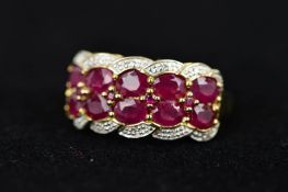 A RUBY AND DIAMOND RING HEAD, designed as two rows of five oval shape rubies to the outer single cut