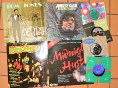 A TRAY OF FOUR LP's AND FOUR SINGLES, including Eddie Cochran, Bobby Darin, Marty Wilde, Ricky