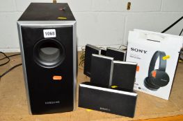 A SAMSUNG SURROUND SYSTEM to include a subwoofer, five speakers and a boxed Sony 2X22OBT wireless