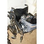 AN INVACARE IMPERIAL FOLDING WHEELCHAIR with separate added TGA electric leisure motor and a