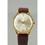 A LEGION WRISTWATCH, the circular dial with Arabic numeral hour markers and brown leather strap,