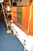A TEAK GLAZED BOOKCASE, a modern dressing table, a yewwood what not and three standard lamps (6)