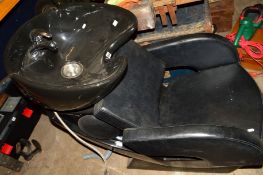 A HAIRDRESSERS HEAD MASSAGE CHAIR with sink