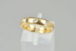 A LATE 20TH CENTURY 9CT GOLD DIAMOND SET BAND RING, three modern round brilliant cut diamonds rub