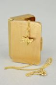 A 9CT GOLD PILL BOX AND A PENDANT, the engine turned pill box of rectangular outline with hinged