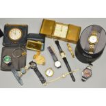 A SELECTION OF WATCHES AND TRAVEL CLOCKS to include lady's and gentleman's wrist watches, a cased