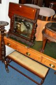 AN EDWARDIAN WALNUT SUTHERLAND TABLE, a long oak footstool and a carved oak swing mirror (3)