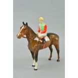 A BESWICK STANDING HORSE AND JOCKEY, No 1862, brown, (chip to Jockey's cap)