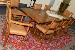 A TITCHMARSH & GOODWIN STYLE DRAW LEAF DINING TABLE on large acorn uprights on sleigh legs united by