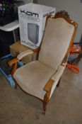 A 20TH CENTURY MAHOGANY ARMCHAIR with oatmeal upholstery