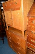 A LIGHT OAK CHEST OF TWO SHORT AND THREE LONG DRAWERS, a stained pine chest of four drawers and an