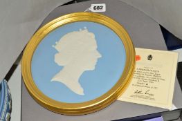 A BOXED LIMITED EDITION WEDGWOOD JASPERWARE FRAME PLAQUE, to celebrate the sixtieth birthday H.M.