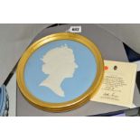 A BOXED LIMITED EDITION WEDGWOOD JASPERWARE FRAME PLAQUE, to celebrate the sixtieth birthday H.M.