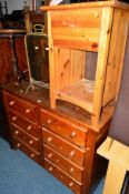 A PINE CHEST of eight side by side drawers and a pine bedside unit (2)
