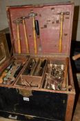 A WOODEN HINGED TOOL CHEST with six individual tray compartments including tools
