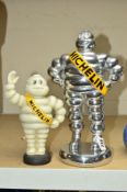 A MICHELIN MAN CAST IRON MONEY BOX, approximate height 23cm, together with an aluminium Michelin Man