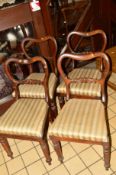 A SET OF FOUR EARLY VICTORIAN ROSEWOOD CHAIRS with central carved back