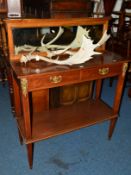 AN EDWARDIAN MAHOGANY AND BRASS MOULDED MIRROR BACK HALL TABLE with two drawers and undershelf,