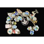 A MID 20TH CENTURY TRAVEL SHIELD CHARM BRACELET to include thirty one various enamelled travel