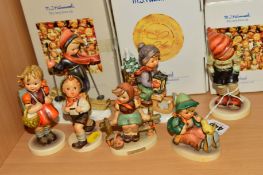 SEVEN HUMMEL FIGURES, 'March Winds' HUM43 (boxed), 'Ride into Christmas' HUM396 (boxed), 'Skier'